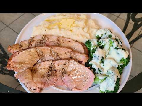 "Stuffed" Pork sirloin roast with mashed potatoes and white cheddar broccoli and cheese