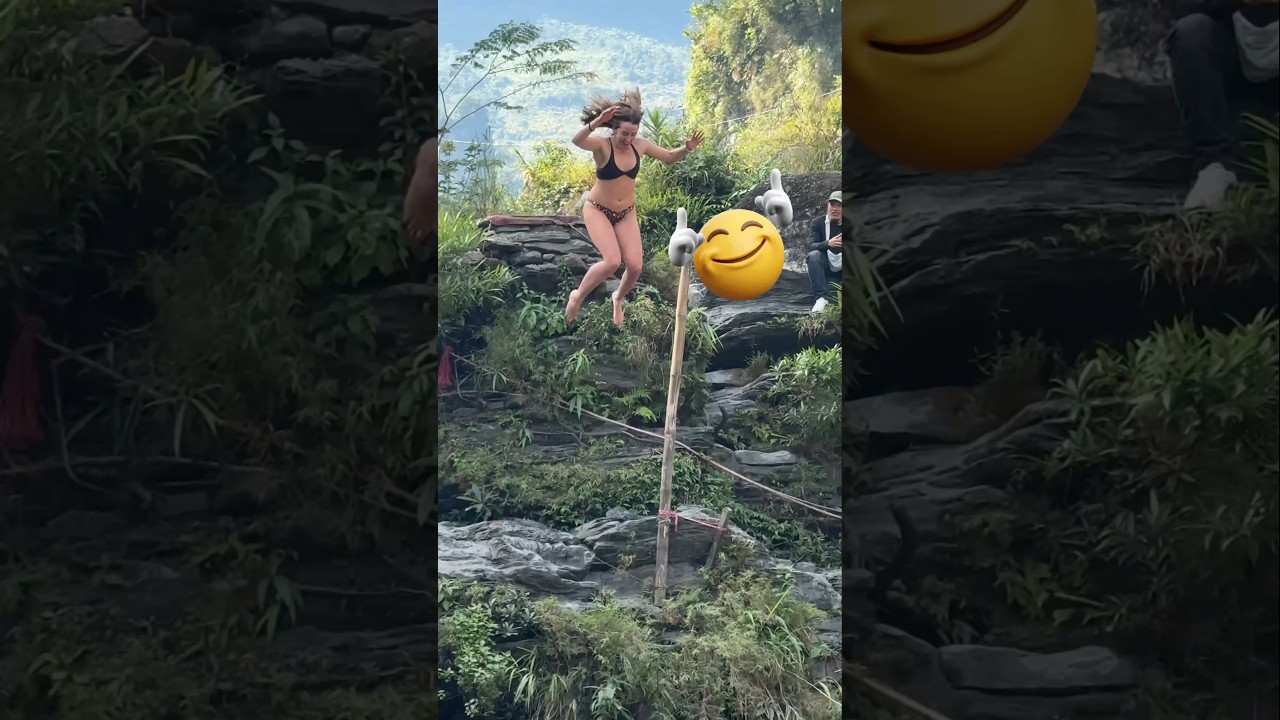 Beautiful Girls Exploring a Scenic Waterfall Spot