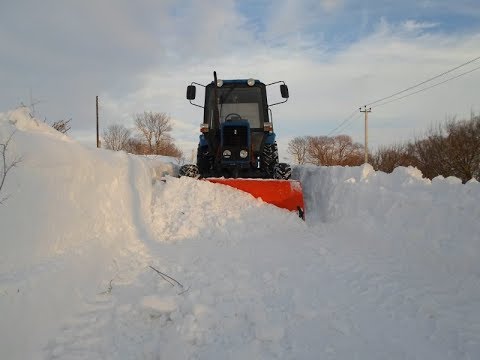 Поворотный  отвал на мТз обзор