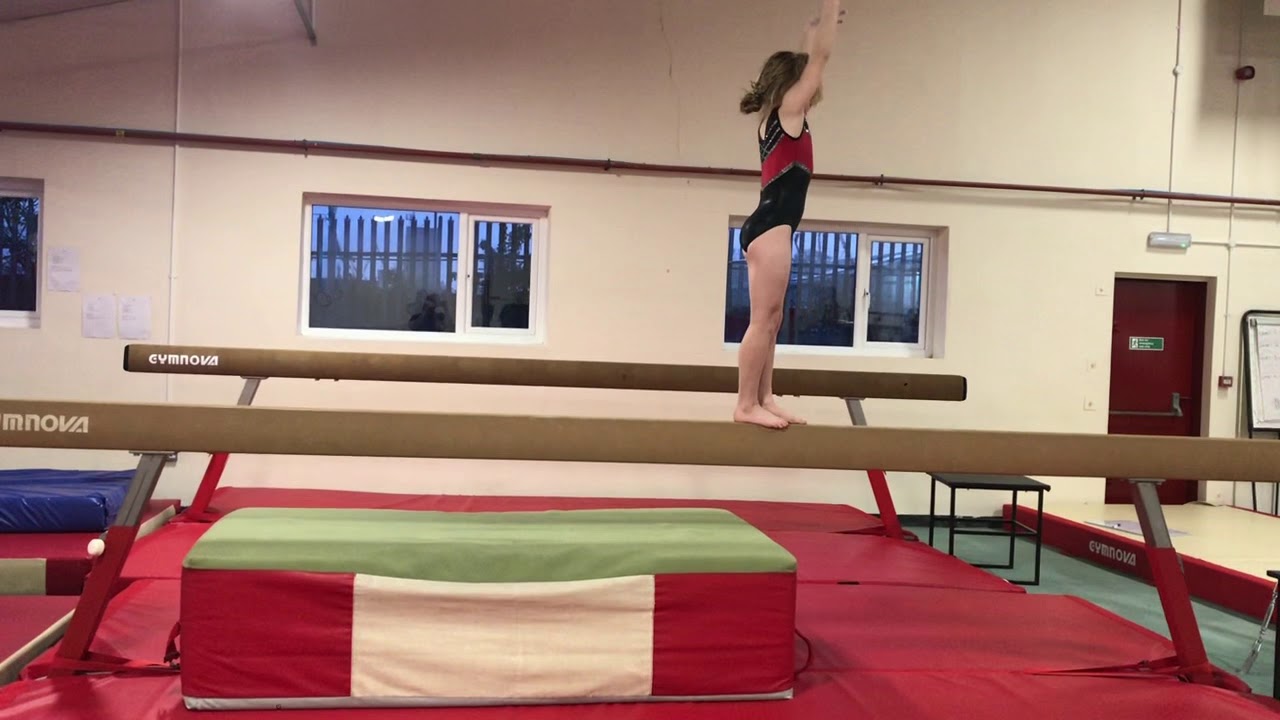 Cartwheel flic on the beam - YouTube