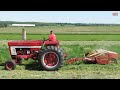INTERNATIONAL 966 Tractor Mowing Hay