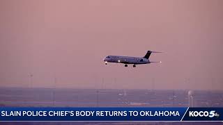 Slain police chief's body returns to Oklahoma