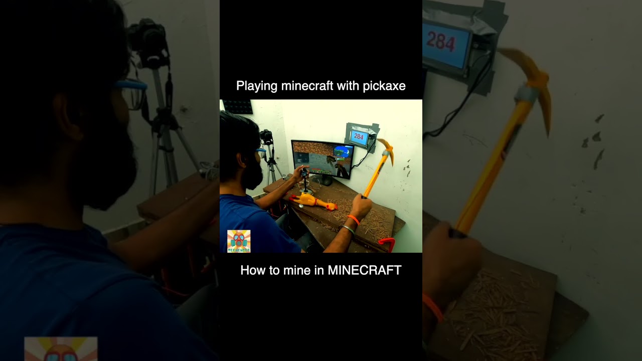 Playing minecraft with real pickaxe 