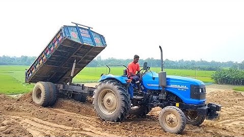 Digital unloading modern facilities of hydraulic tractor system and unload a soil over rough hills