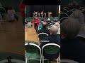 The Wildcat Cheerleaders of Bethel Youth Sports hype up Town Meeting Day voters