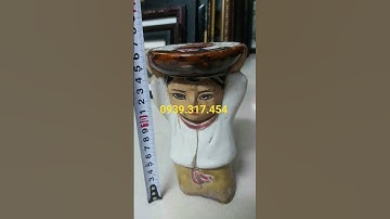 cô gái đội đèn gốm Biên Hòa