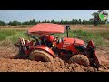 Agricultural tractor in cassava plantation Mountain Stuck In The Sand