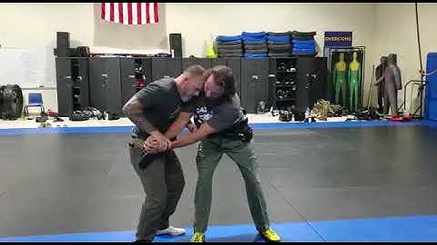 In holster handgun retention