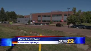 Group protests Harrison District two