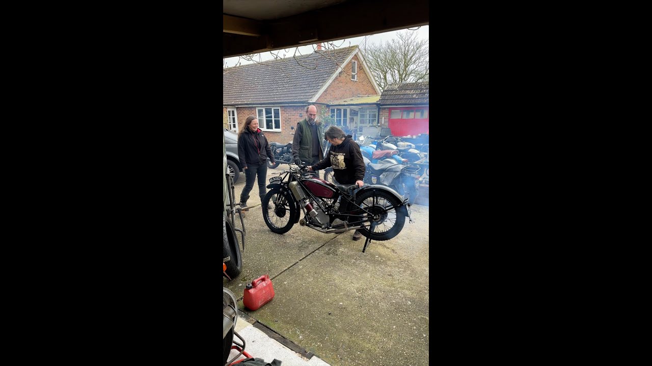 Julie starts her 1927 Scott Flying Squirrel for us