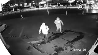A glorious surveillance video clip has hit the Chinese internet showing why a pair of thieves were stopped at the front door.

The footage shows two men in hoods approach a building and take out brick