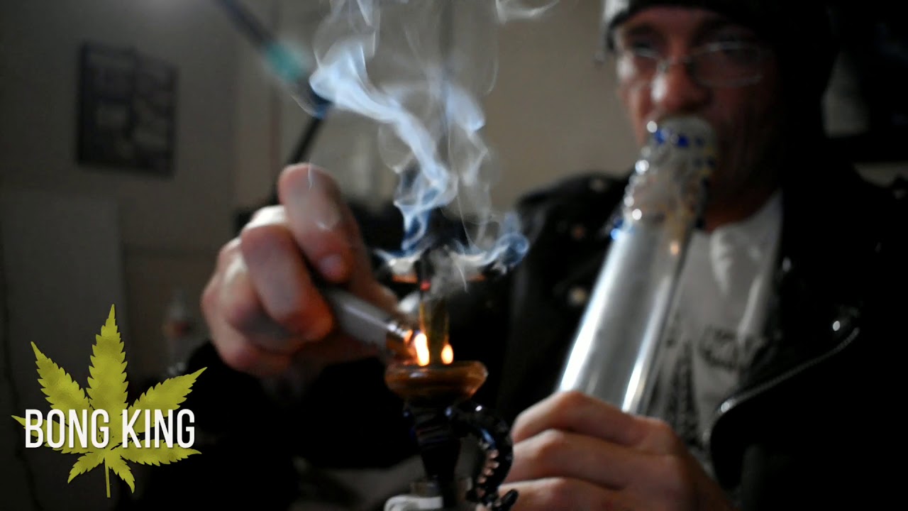Bongking smoking a huge cross joint out of the bong!