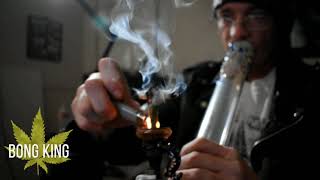 Bongking smoking a huge cross joint out of the bong!