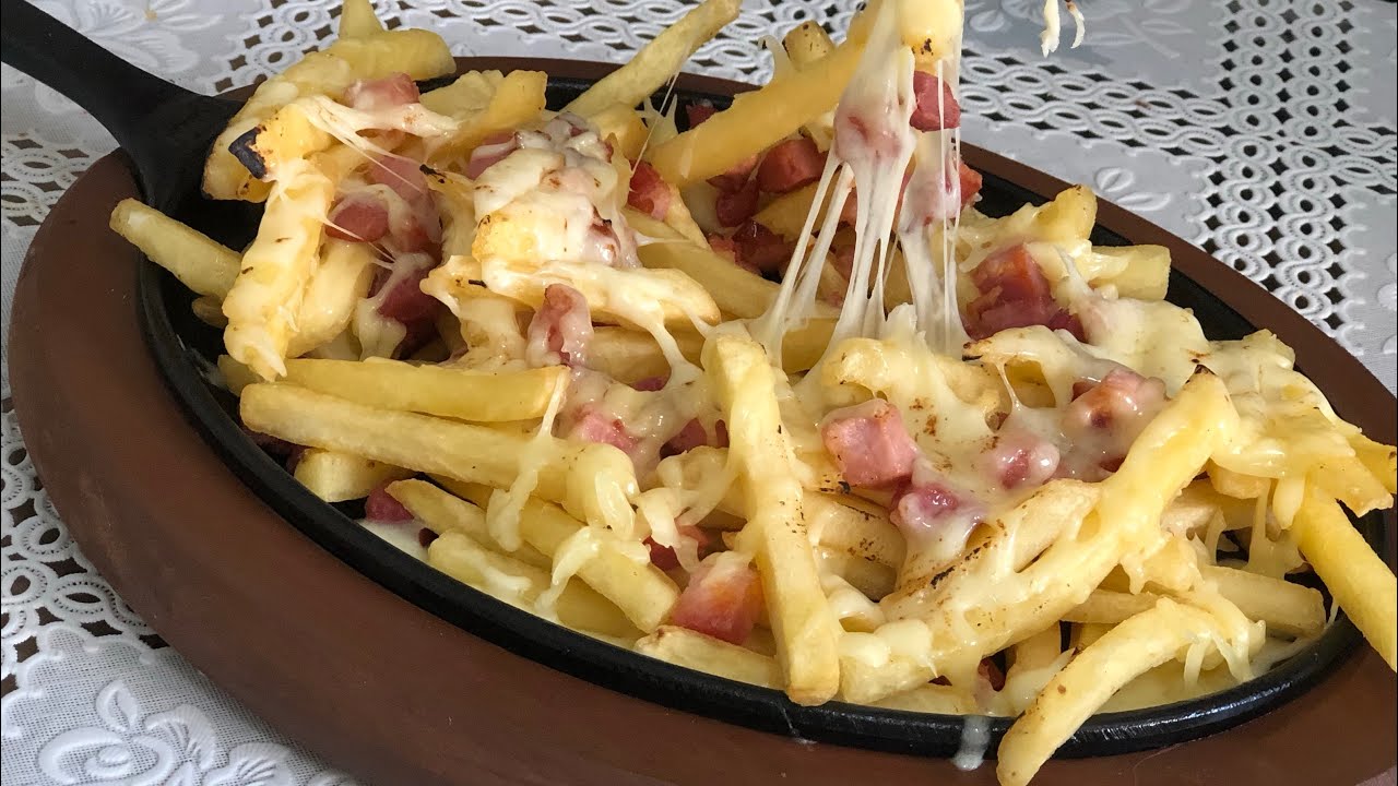 PORÇÃO DE BATATA FRITA COM QUEIJO E BACON - dicas de restaurante