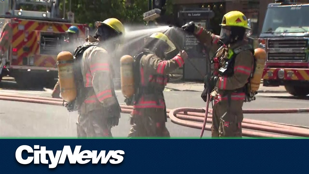 Firefighters battle blaze in Montreal’s Mile End amid heat wave - YouTube