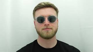 Male model wearing Oliver Peoples Gregory Peck 5217 1101/R8 Sunglasses