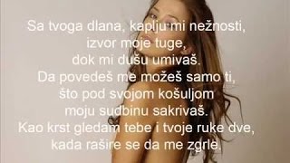 Video thumbnail of "Karolina Goceva - Ljubav je moja religija (lyrics)"