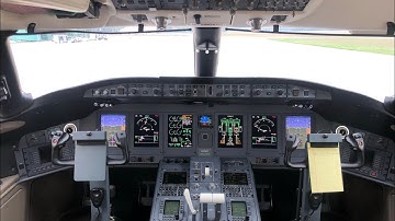 Cockpit of a Global Express XRS, 6000, and jets at MKG, (KMKG).