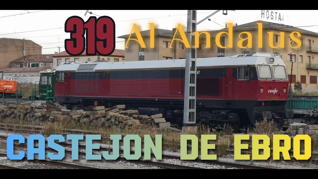 Visita a la 319.304 con los vinilos del Al Andalus estacionada en Castejón de Ebro