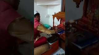 November 2021 Diwali - pappa doing pooja & Akshuvis playing on sofa at my home sweet home