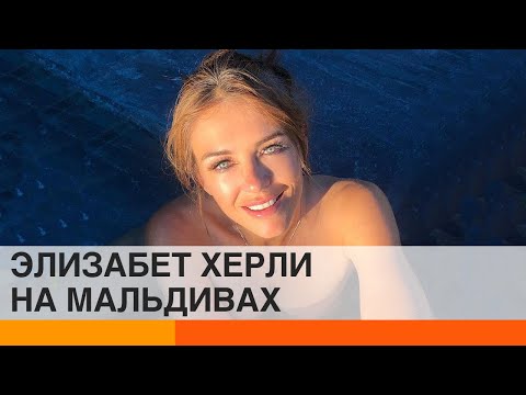 Видео: Лиз Хърли позира в бикини на Малдивите