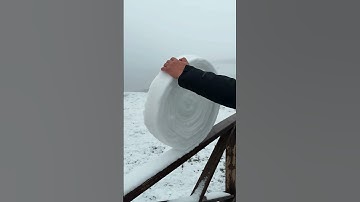 The process of clearing snow from the railings