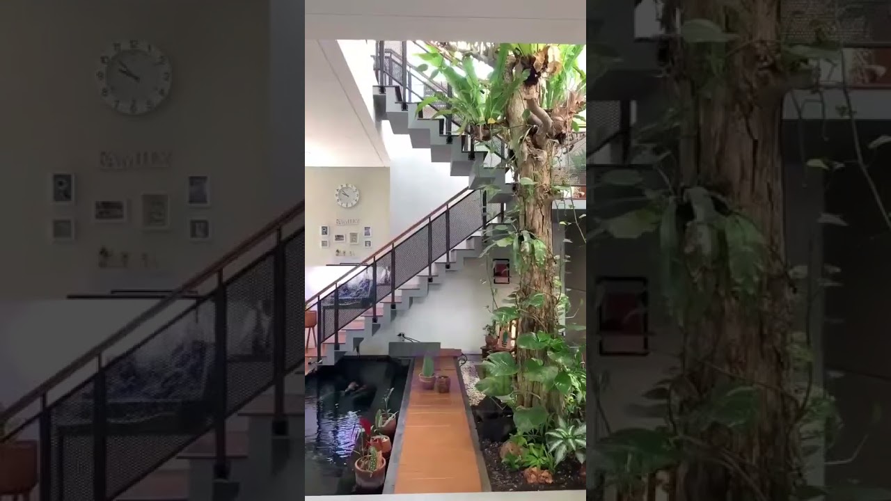 Koi Pool Serenity in a Beautiful Staircase Atrium