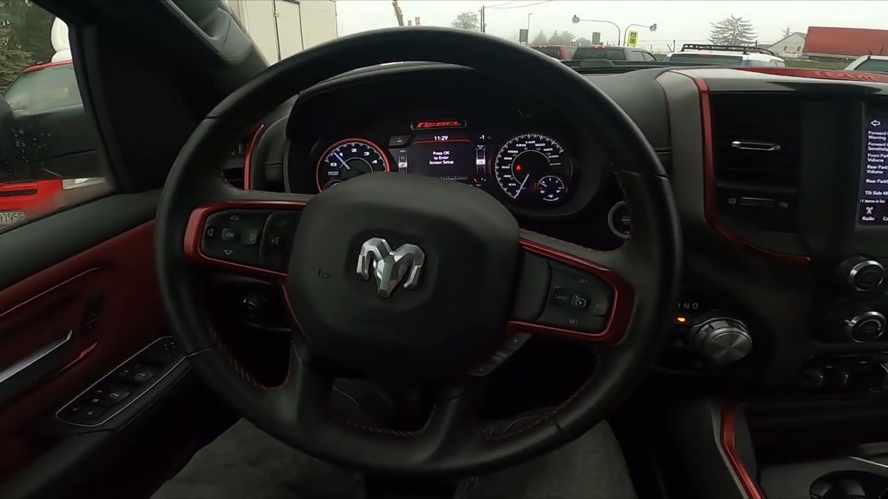 How to Enable or Disable Rear Parksense Braking Assist in Dodge RAM REBEL 1500 II ( 2019 - now )