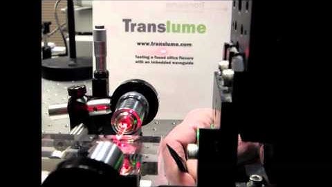 Fused silica flexure with imbedded waveguide