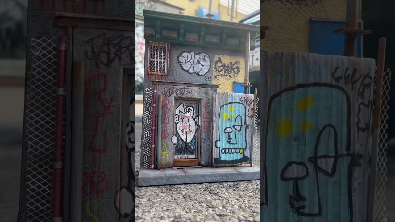 Miniature replica graffitied building in Bushwick 