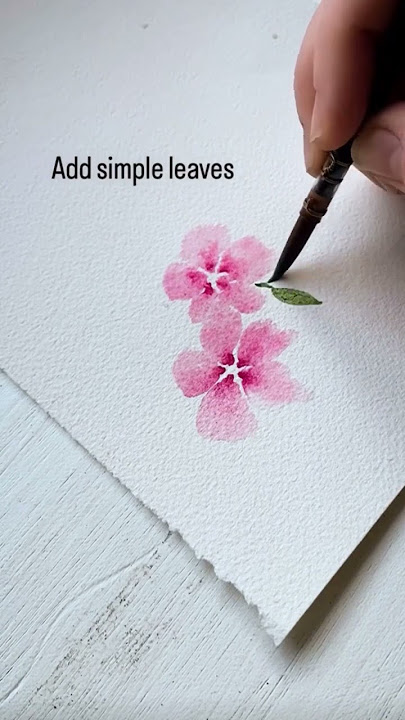 If you’re stuck with watercolor flowers, try this easy way to paint perfect little petals every time