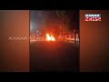 Visuals of car catching fire outside parija library at utkal university bhubaneswar