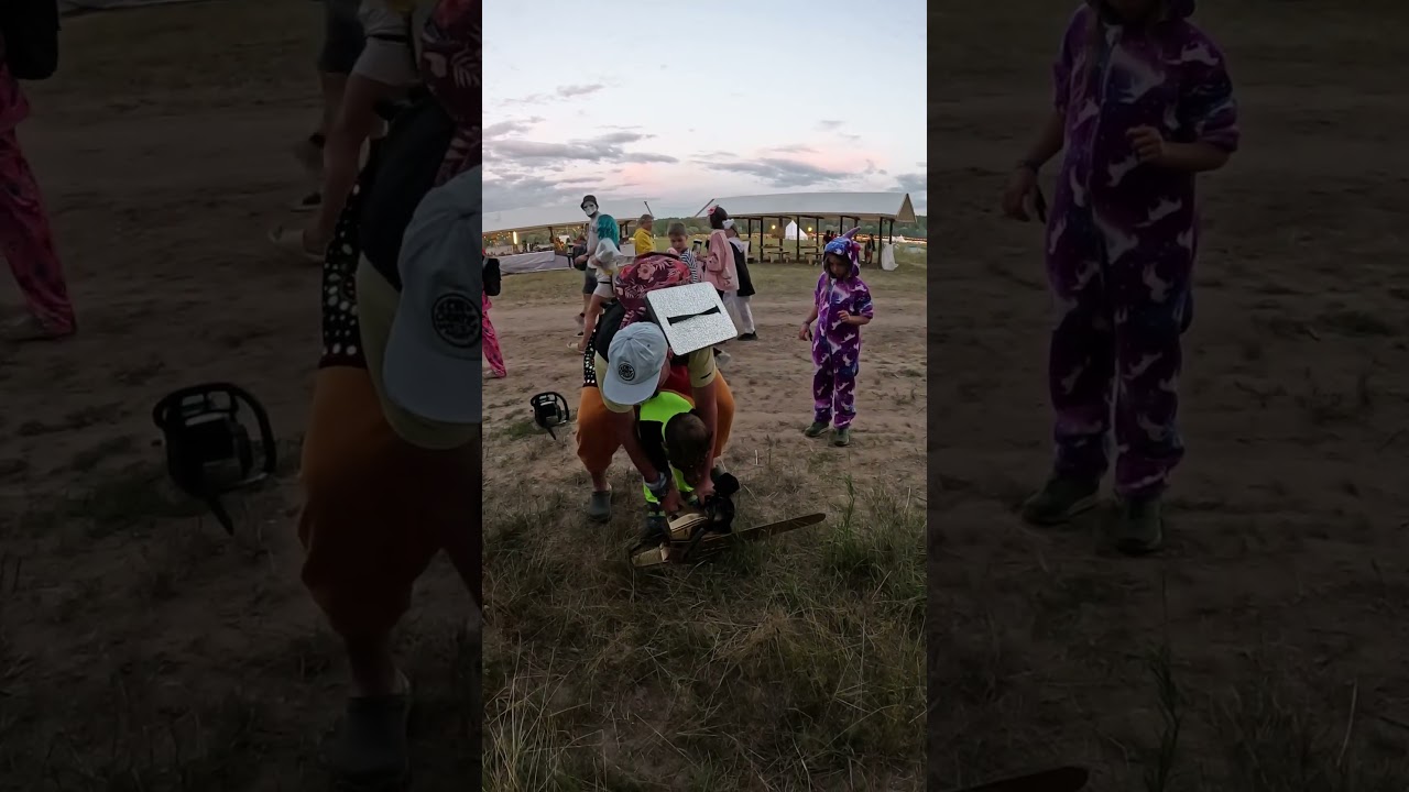 мальчик заводит бензопилу | child starts a chainsaw  