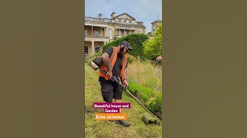 Strimming with a Echo strimmer at this stunning house #architecture #gardeningtools #machinery #reel