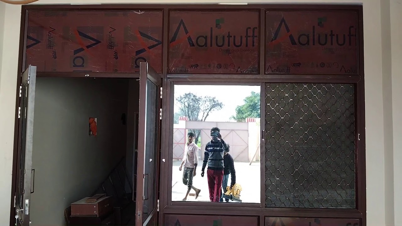 aluminium partition brown colour with window slitting 2 track + jaali