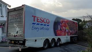 A Tesco articulated lorry gets stuck twice in Swansea, Wales, UK