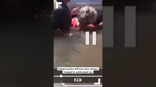 Indiana police officers save woman trapped in submerged car