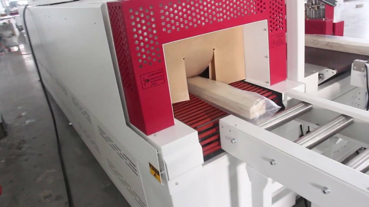 long timber shrink wrapping machine with pop-up conveyors to save space