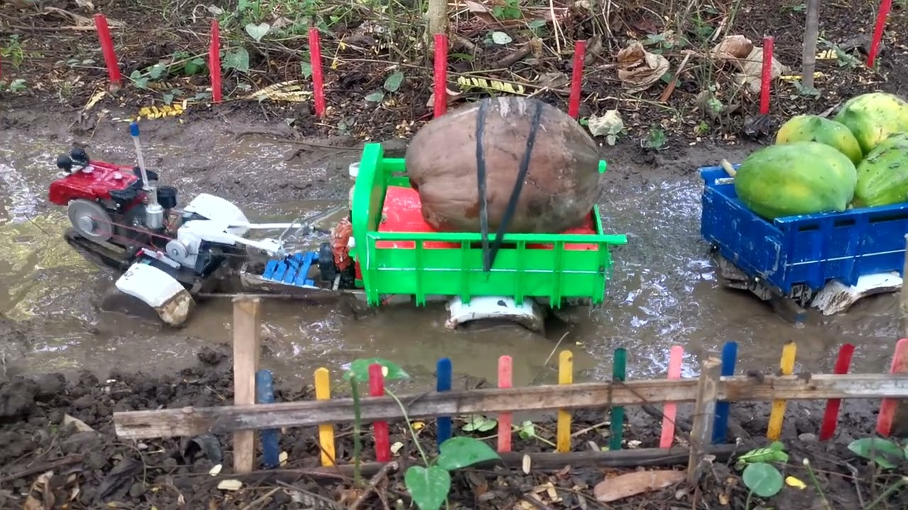 diy heavy mini tractor carrying a shipment of fruit stuck in the mud | diy tractor making mini roads
