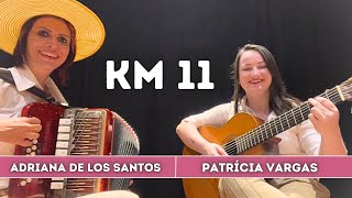 Km 11 by ADRIANA DE LOS SANTOS e PATRÍCIA VARGAS