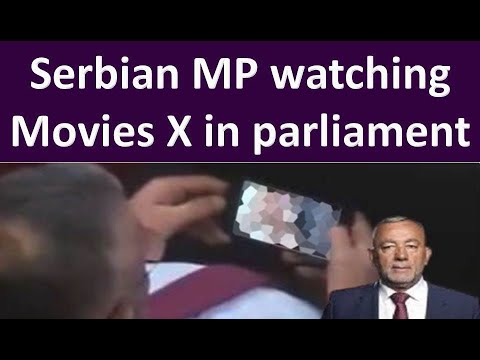 Zvonimir Stevic | Serbian MP Zvonimir Stevic | Resigned Serbian MP watching Movies in parliament