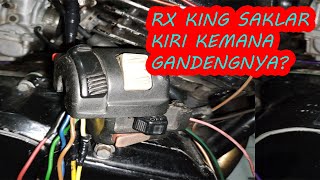 Where does the cable route go on the left holder of the left switch on the RX King? Where does the cable route go on the left holder of the left switch on the RX King?