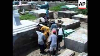 Residents in Haiti have started to bury some of those who died during Hurricane Ike. This as foreig