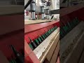25 spindles, 1 pass—dowels + screw holes! Would you run this in your shop? #woodworking #cabinets