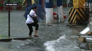 Motorists, pedestrians brave flooding in Taft Avenue due to Severe Tropical Storm Paeng