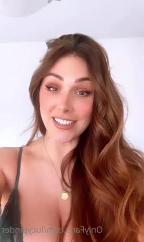 Lucy Pinder talking with awesome cleavage