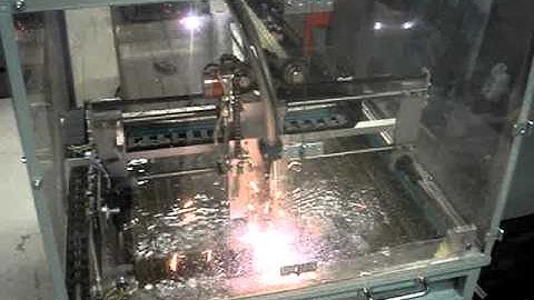 CNC plasma with waterbed and vented enclosure