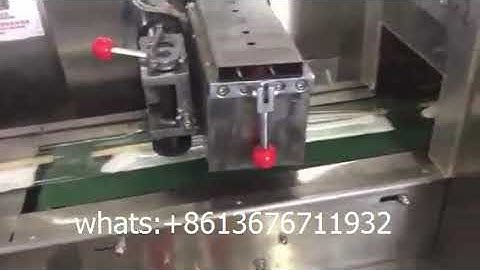 wet tissue refreshing towel Sachet automatic cutlery feeder packing machine