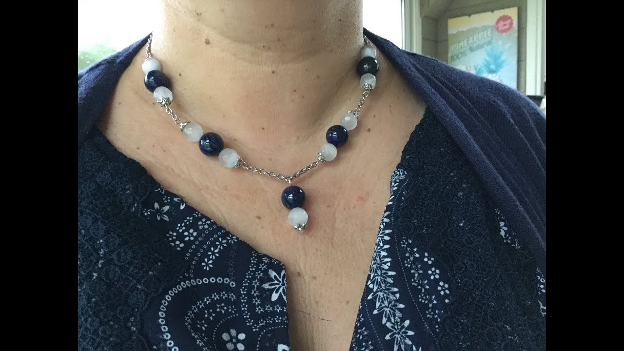 Collier de perles espacées par des chaînes