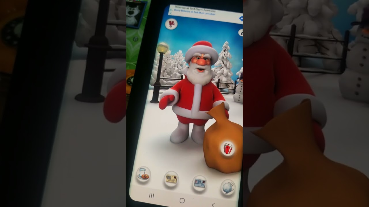 Orchid the 2005 Furby talks to Talking Ben and Santa